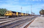 AT&SF SD40-2 5027, leads a westbound out of Needles, California. June 29, 1982